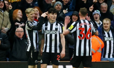 Tino Livramento (centre) celebrates after scoring Newcastle’s third goal..