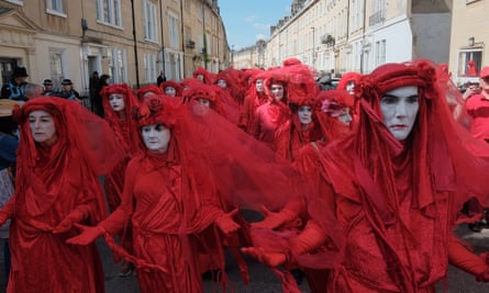 The Red Rebels marching at the Funeral for Nature processions in Bath, England