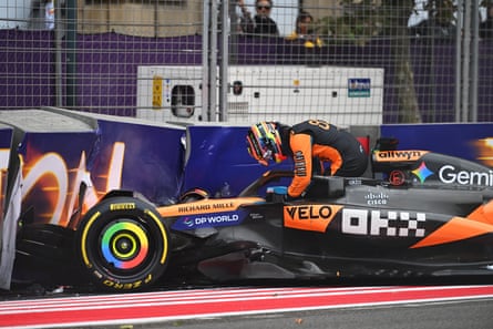 Oscar Piastri climbs out of his car after crashing on the first lap of the F1 Azerbaijan GP.