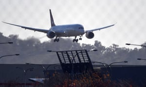 A Qantas flight carrying Australians who were stranded in India lands at Canberra airport