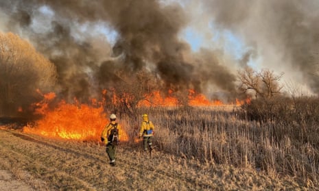 Firefighters tackle the Marcy Road fire in Menomonee Falls, Wisconsin. 