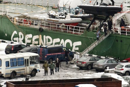 Peter Willcox and others leaving the Arctic Sunrise in Murmansk after its seizure by Russian authorities.