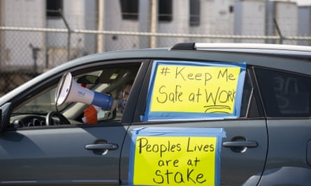 Demonstrators protest working conditions at a Pilgrim’s Pride poultry processing facility in Minnesota.