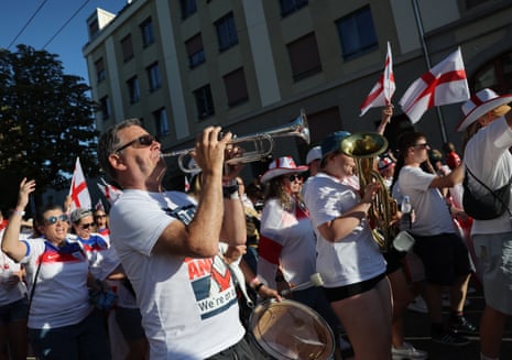 England fans on a fan walk to the stadium.