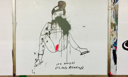 Cartoon of menstruating woman by the comic artist Liv Strömquist at Slussen station, defaced by black paint.
