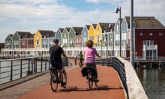 Cyclists near properties in the Netherlands