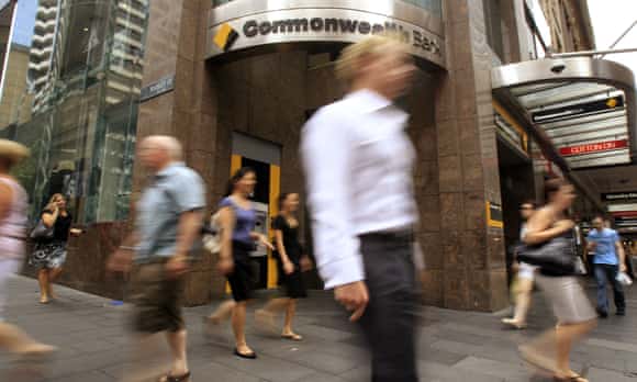 People walk past a Commonwealth bank branch in Sydney