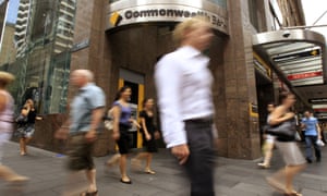 People walk past a Commonwealth Bank branch in Sydney