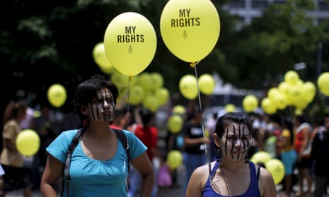Women take part in a demostration against anti-abortion laws at the congress in San Salvador on 22 April 2015.