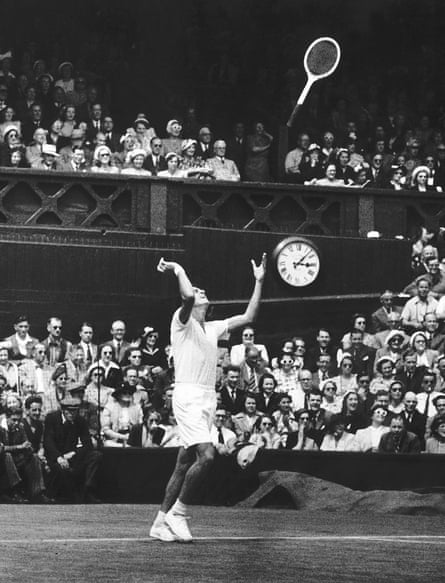 Dick Savitt throws his racket in the air after winning the 1951 Wimbledon men’s singles final against Ken McGregor.