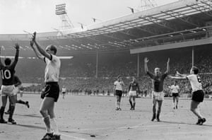 Both sets of players appeal to the officials after Geoff Hurst’s shot hit the underside of the bar and bounced back down with keeper Hans Tilkowski beaten.
