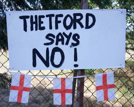 A sign zip-tied on to the fence of RAF Barnham reads “Thetford says No!”