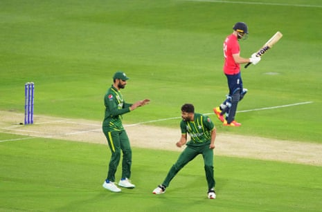 Pakistan's Haris Rauf celebrates with team-mates after the dismissal of England's Phil Salt.