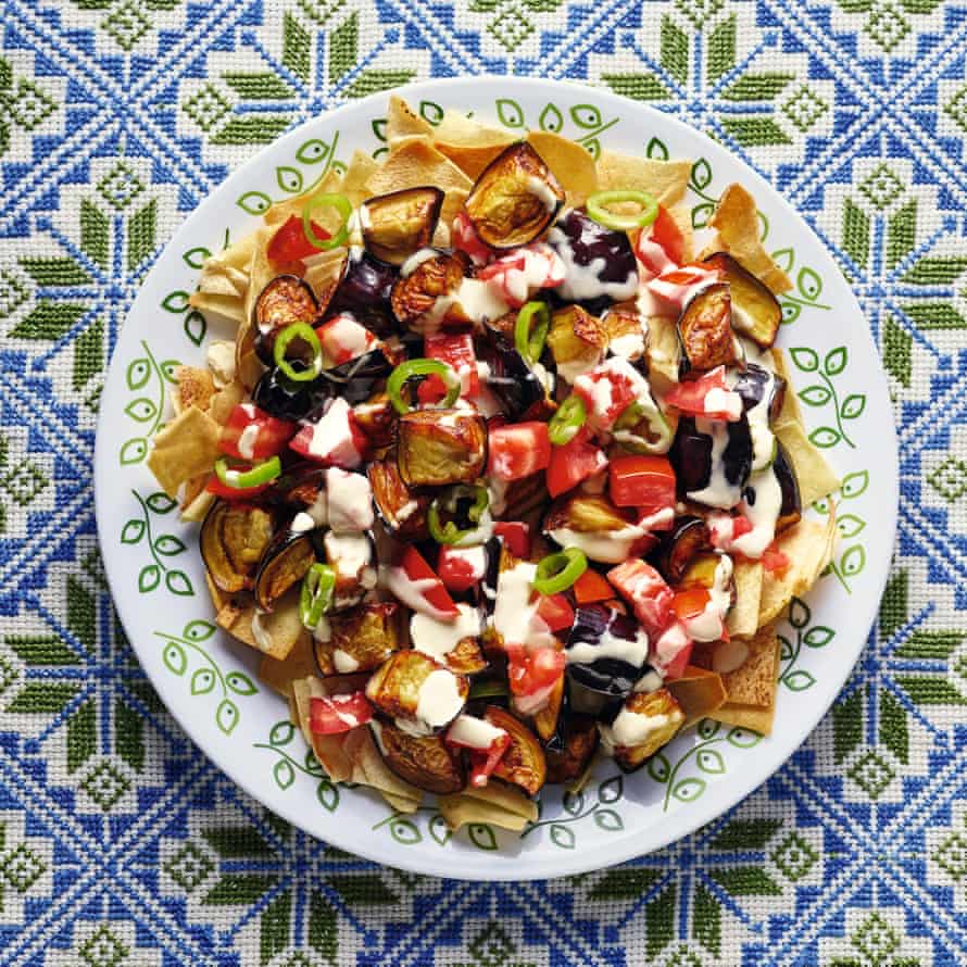 Fried aubergine, tomato and chilli salad with toasted pitta.