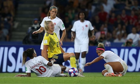 Sweden’s Fridolina Rolfo is fouled by Ashley Lawrence.