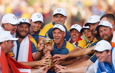 The European team celebrate winning the 2023 Ryder Cup with the trophy