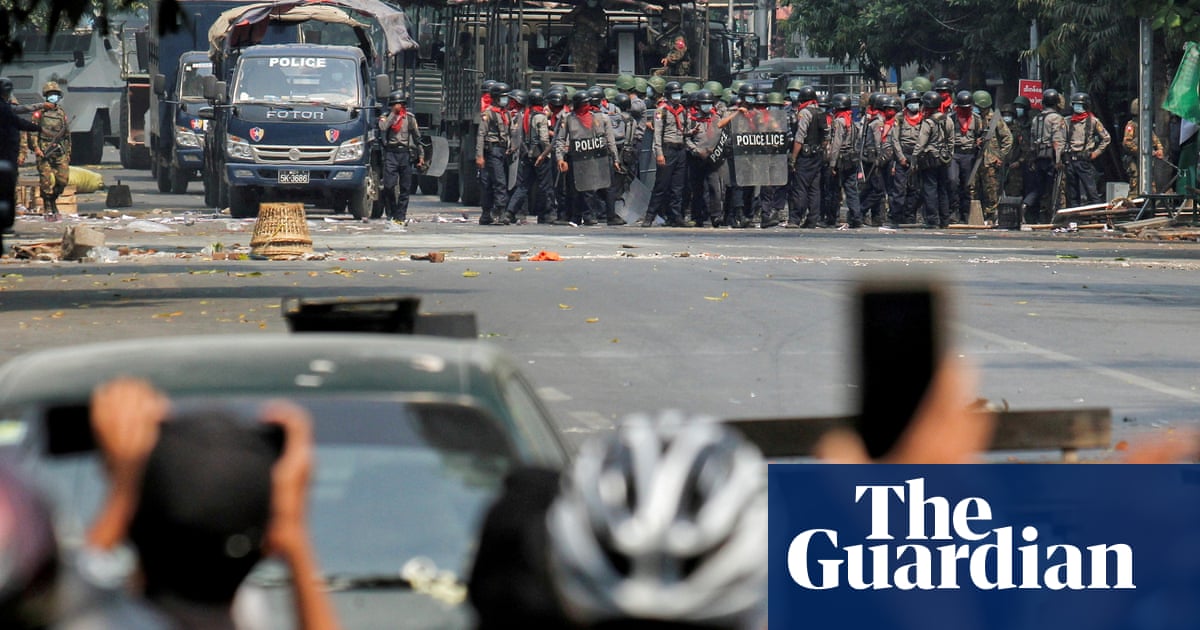 Fears of fatalities after Myanmar troops 'use car to ram anti-coup protest' | Myanmar | The Guardian