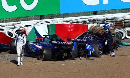 Australia’s Daniel Ricciardo walks away from his car after crashing with Alex Albon on lap one of the Japanese Grand Prix at Suzuka.