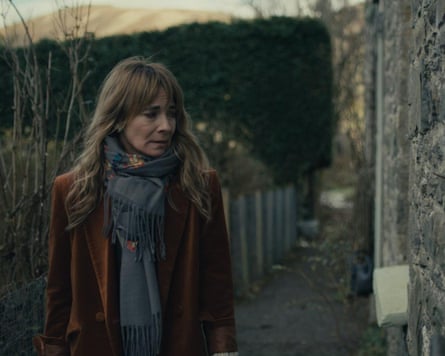 A woman looking to the side in a worried way