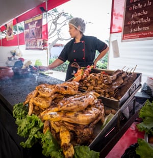 A street vendor selling chicken and anticuchos in the Barranco district of Lima.