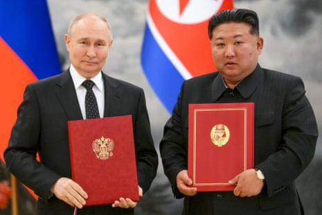 Vladimir Putin and Kim Jong-un pose for the cameras in Pyongyang.
