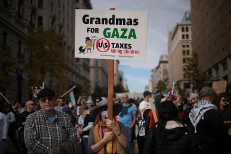 Protesters gather nearFreedom Plaza during the National March on Washington for Palestine while calling for a ceasefire between Israel and Hamas on November 4, 2023 in Washington, DC.