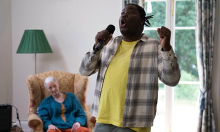 Undercover cop Kay (Hammed Animashaun) entertains the residents of the old people’s home