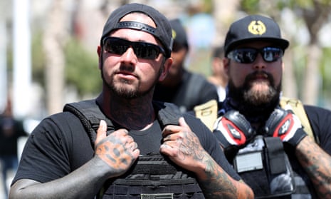 Far right activists wearing body armor look on during a freedom of speech rally in front of city hall in San Francisco, California, on 3 May. 