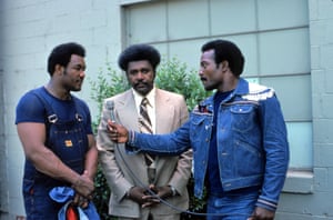 Jim Brown interviewing George Foreman (left) and Don King (centre) before the ‘Rumble in the Jungle’ 1974 heavyweight championship boxing match.