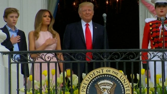 Melania Trump Nudges Donald During Easter Egg Roll National Anthem Video Us News The Guardian