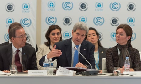 John Kerry delivers remarks at the Caring for Climate Business Forum during the COP 21 talks.