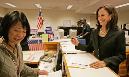 District Attorney Kamala Harris, right, smiles at Coni Binaley, left, campaign services coordinator, as she prepares to sign election papers Wednesday, Nov. 12, 2008, at city hall in San Francisco.