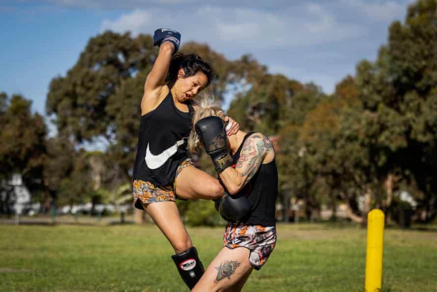 Deb Doan delivering a sok tong to the author’s head: “Muay Thai is an extreme version of just one facet of myself, because I do everything to the extreme.”