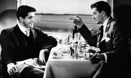 Farley Granger, left, and Robert Walker in the 1951 film adaptation of Strangers on a Train.