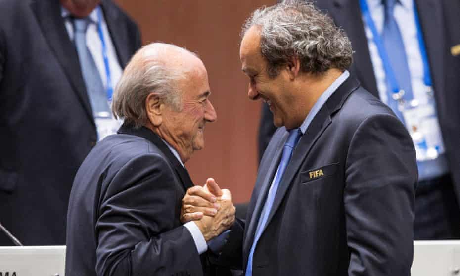 Sepp Blatter and Michel Platini greet one another in Zurich in 2015