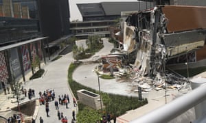 The Artz Pedregal shopping mall stands partially collapsed in Mexico City, on 12 July. 