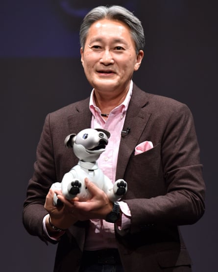 Kazuo Hirai with Aibo, Sony’s robotic ‘entertainment dog’.