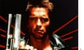 Arnold Schwarzenegger in a leather jacket holding a silver handgun with telescopic sights.