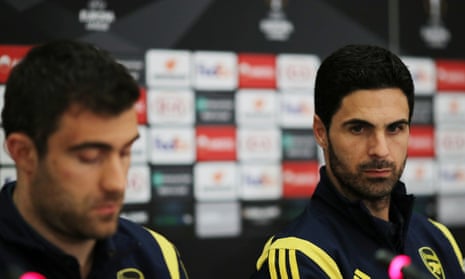 Arsenal’s manager, Mikel Arteta (right), and Sokratis Papastathopoulos field the questions at the Olympiakos ground.