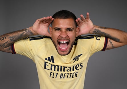Bruno Guimarães poses with his goal celebration after signing for Arsenal.
