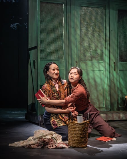 Gabby Wong as Lan Ping, left, and Millicent Wong as Li Lin, right, in Shanghai Dolls at Kiln Theatre.