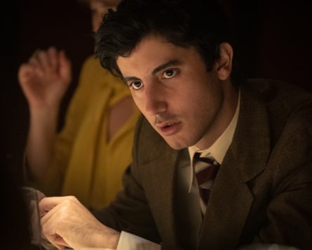 Anthony Ippolito as Al Pacino in a brown suit looks intently to the side