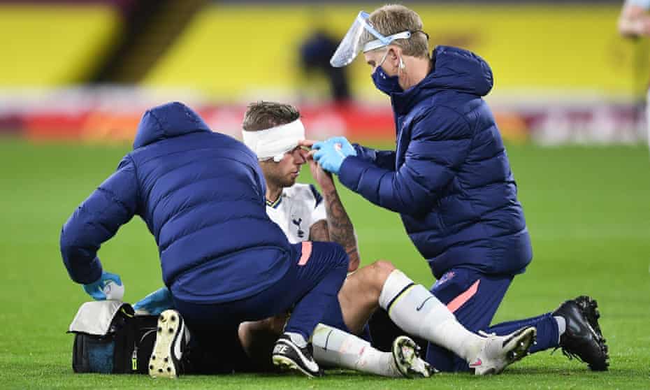 The Tottenham defender, Toby Alderweireld, receives treatment for a head injury