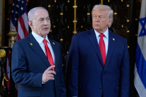 Donald Trump listens as Benjamin Netanyahu speaks at the US president's Mar-a-Lago club in Palm Beach, Florida, in December 2025.