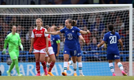 Chelsea’s Guro Reiten celebrates after Katie McCabe of Arsenal put her penalty wide