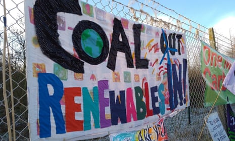 A banner at a Friends of the Earth rally opposing the new coalmine near Whitehaven in Cumbria