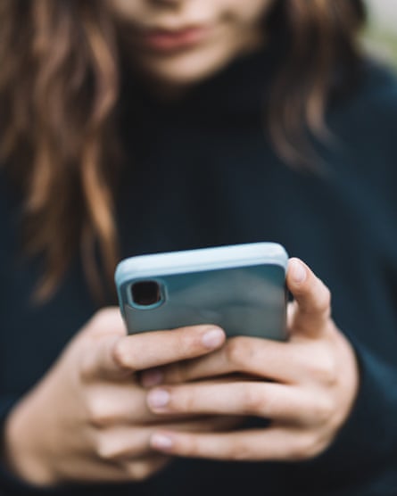Teenager girl with smartphone.