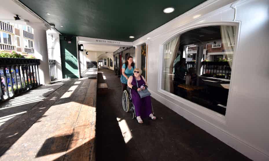 Accessible shopping on the elevated walkways of Chester Rows