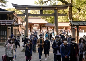 Visitors leave the main shrine after praying for their health, property and a good future during their first visit of the new year at Meiji Shrine in Tokyo, Japan, 01 January 2021. Usually, more than three million people visit Meiji Shrine during the first three days of the New Year.