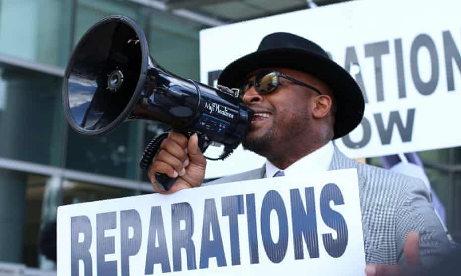The Rev Dr Robert Turner of the Historic Vernon Chapel AME Church holds his weekly Reparations March in Tulsa, Oklahoma.